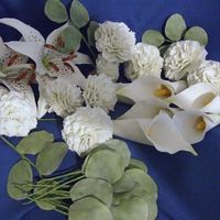 White Tiger Lilies, Calla Lilies, Carnations The carnations are made with several layers of the same size cutter using the frilling tool and dragging the ends out. They are very heavy...