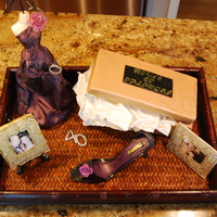 Shoe And Shoebox Cake The shoebox is cake, the lid is RKT, the tissue paper is gumpaste. The frames are gumpaste overlaid with poured sugar. The shoe is...