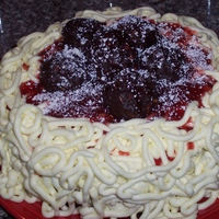 Spaghetti Cake Made this cake for a friend of mine who was having a spaghetti potluck at work. Lots of fun to make. Meatballs are RKT covered in chocolate...