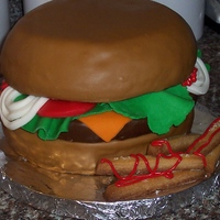 Cheeseburger And Fries I made this "Darn Good" chocolate cake with vanilla buttercream and MMF for a co-worker. Fries are sugar cookies. TFL!