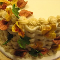 Fall Leaves red velvet cake with cream cheese filling and cream cheese icing basket weave gum paste leaves. TFL