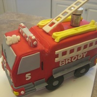 Brody's 5Th Birthday White cake, with butter cream icing, covered in fondant. fondant, gum paste, and modeling choc accents.