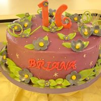 16Th Birthday A cake for my niece. She likes the color the purple. Fondant decorations with butter cream. Idea was from the Wilton book for a Tinkerbell...