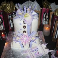 Sexy Sixty Gumpaste flowers from toedna's tutorial. First time making them. Thank you Edna