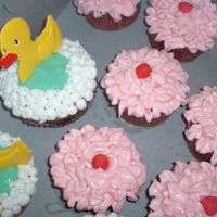 A Few Ducky Cupcakes And Pink Fora baby girl baby shower...the mom-to-be loves those little ruffle butt pants for baby girls. The ducky cupcakes are the key lime ones....