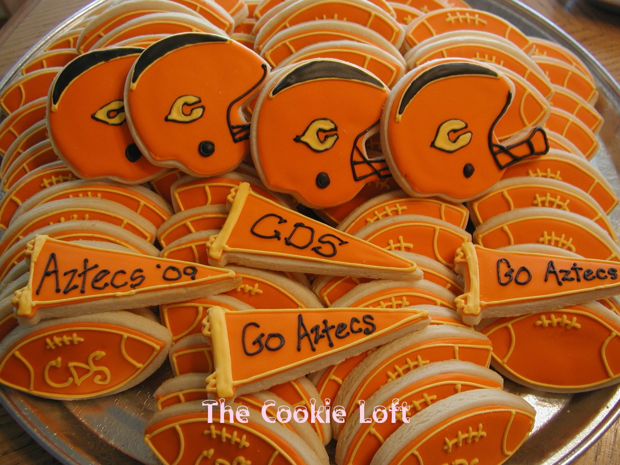 Football! NFSC and Dark Chocolate Rolled Sugar cookies w/Antonia74's RI. I made these cookies for a high school football pre-season potluck....