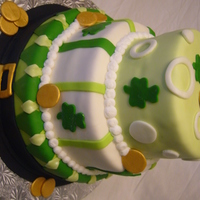 St. Patrick's Day Cake For The School Vanilla caked dyed green with vanilla buttercream filling. All marshmallow fondant decorations. For my daughters school party. Thanks to CC...