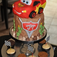 Lightning Mcqueen Cake I made this cake for my son's 3rd birthday and mini cupcakes to go with it. McQueen is made out of cake, and fondant.