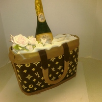 Champagne Bottle Cake This cake is great for any type of celebration. This tote bag is yellow cake with buttercream filling layered in chocolate ganache. The...
