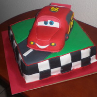 Disney Cars White cake with cookies-n-cream filling. covered and decorated in fondant.