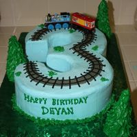 Thomas The Train Cake I copied this idea from one i saw on cake central with a 2 instead of a 3. Thanks Lorimc for the great idea! Trees were made out of ice...