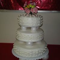 Anniversary Cake french vanilla cake filled with pineapple, butter cream icing. made for a womens meeting and it fed 100 persons.