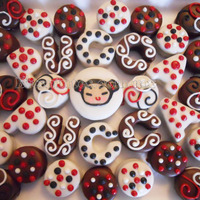 Pucca Alfajores These are chocolate covered alfajores (dulce de leche sandwiched between 2 soft cookies) decorated with more chocolate based on the Pucca...