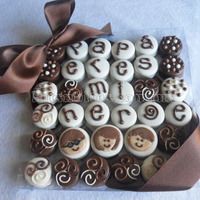 Family Alfajores Alfajores covered in chocolate. Decorated with more chocolate