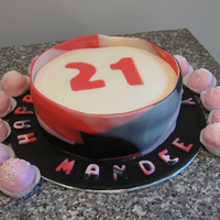 Fondant Wrapped With Cake Balls For my niece's 21st birthday. The cake is wrapped in a multi-colored fondant strip and covered with cheesecake balls covered in...