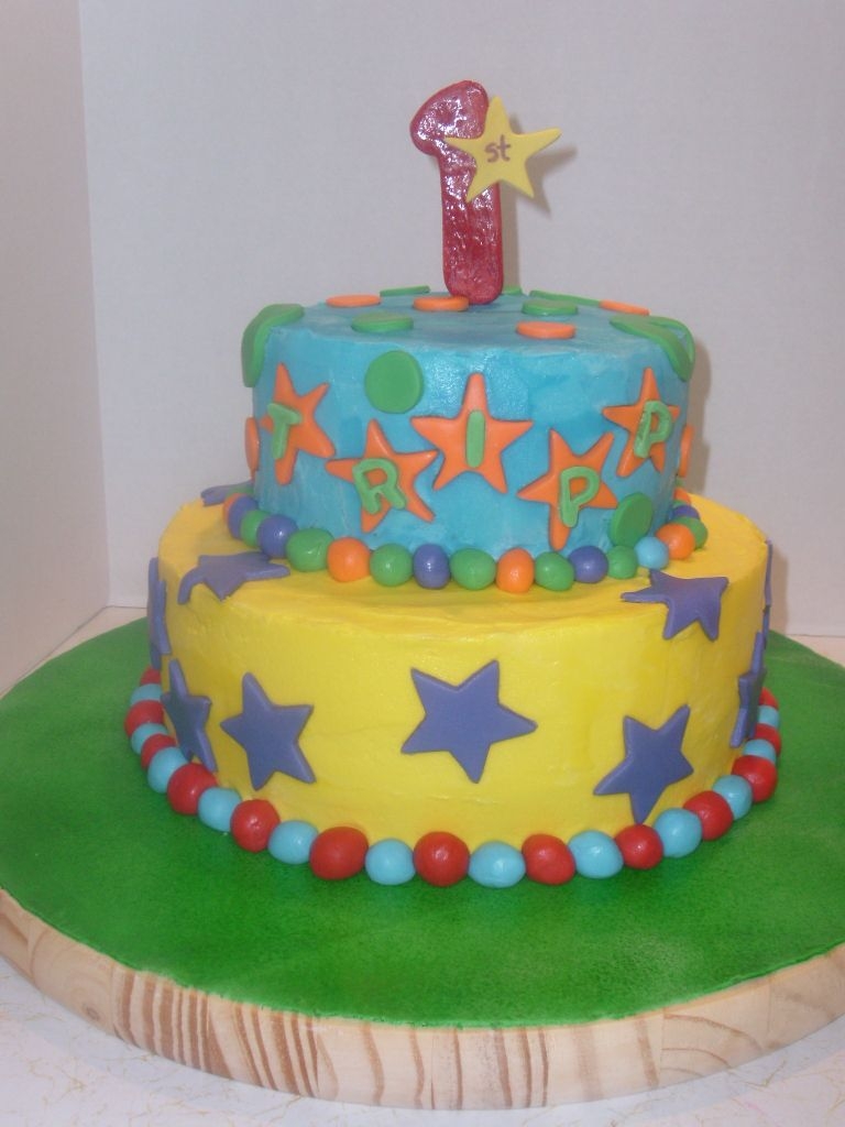 1St B.day Cake W/smash Cake This one didnt really have a theme. It was just to match the plates. TFL
