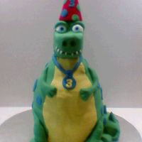 Birthday Dino Carved fudge cake w/ foam head covered in fondant. TYFL!