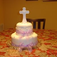 Baptism Cake This cake was a disaster! It was my first attempt at a layered cake. The bottom is dark chocolate with peanut butter mousse and the top is...