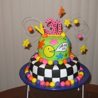 80's Theme Birthday This cake was decorated and iced in butter cream and rolled fondant, A practice cake for me to improve my skills..=)