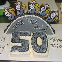 Nifty At Fifty A birthday cake that I made for a close friend, the buzzards are cookies=)