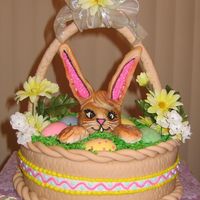 Easter Basket This is a 10" 2layer cake with rolled fondant and butter cream icing, the rabbit I molded out of rice crispie treats and covered with...