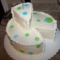 Polka Dots Cake on top is baby smash cake. Cake kinda flopped... chocolate crumbs in white frosting and I didn't finish the top piece to look...
