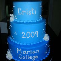 College Graduation College graduation. All buttercream with fondant roses and graduation cap.