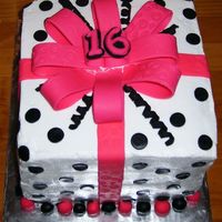 First Present Cake my first time to do a 4 layer cake, and my darn bc would not crust over for the life of me... I think it was b/c my a/c broke and it was...