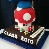 Super Mario Grad Cake I made this for my son this weekend. He graduated from HS and is into Super Mario. I thought it would be best to have the gamer in him...