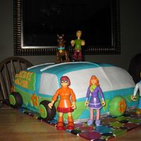 The Mystery Machine I made this for my son's 2nd birthday. He loves Scooby Doo. It was a massive cake. My husband called it the double wide mystery...
