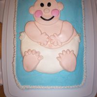 Little Chubby Baby This was my first baby shower cake. It was alot of fun to make! The baby is made from Marshmallow fondant.