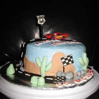 Dr. Mcqueen Cake My friend and I made this cake for a doctor she works for. His name is Dr. McQueen and he likes to race cars! Its MMF except for the car of...