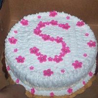 102_0303.jpg I made this for my grandaughter. Bcream with fondant flowers. The S for Suheydi.