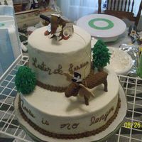 Moose Cake Last minute cake for a rehersal dinner. The groom's nick name is "Moose", so I did two fondant moose. the one on tope is the...