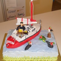 Sail Boat Birthday Cake Sailboat is made from rice krispy treats and fondant. String for ropes and lines. Animals are all fondant.Cake is chocolate with chocolate...