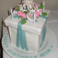 Mom's Bday Cake Gum paste flowers with fondant box and ribbons.