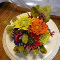 Gerbera Daisy A cake topper for a wedding cake. The bride wanted bright colors as the reception was a Fiesta with a Taco Bar.