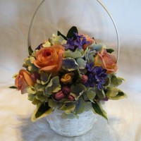 Flower Basket An arrangement of gumpaste flowers I put together for a fund raising auction.