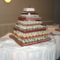 Cupcake Tower 300 cupcakes - 5 different flavors. The cupcake tower was home made from plywood and fabric.