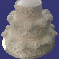 Recreation Of Wedding Cake For 50Th Ann. I recreated the couple's wedding cake from 1959 with this cake. The picture I had to recreate it from was blurry and black and white....