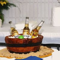 Corona Cake Lemon flavored groom's cake. Barrel and Lime made of fondant. Ice chips were wedding mints. The sand was made out of a mix of light...