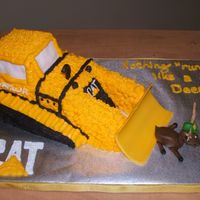 Cat Bulldozer Grooms Cake This was a groom's cake I did. The groom works for CAT and is anti John Deere. The bride asked for a CAT bulldozer chasing down a &...