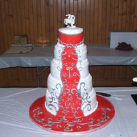 Round Wedding Cake 5 Tiers of boston cream pie flavored cake covered in fondant with hand painted silver piping accents. This cake was designed off the bride...