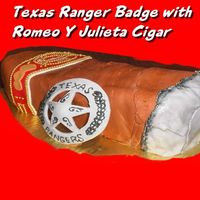 Texas Ranger Badge & Romero Y Julieta Cigar 9x13 cake cut in half and stacked, then shaped like a cigar. Deep Dark Chocolate Cake covered with Mocha buttercream with MMF decorations...