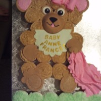 Teddy Bear Cupcake- Baby Shower This was a special request for a teddy bear cupcake for a baby shower. Accents are done in fondant and hardened before decorating cake. Bib...