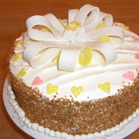 Just Because Cake Buttercream icing, fondant bow, and crunch on outside edge