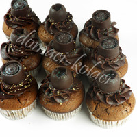 Chocolate Cupcakes chocolate cupcakes with ganache, decorated with pralines - marzipan nougat cream filing :D