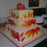 "warhol" Flower Wedding Cake My attempted version of the Warhol cake. Fondant icing w/ painted flowers & buttercream borders. Gumpaste flowers for topper.