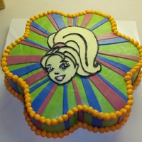 Polly Pocket Cake Wilton flower pan, 3-layer chocolate cake w/ chocolate pudding filling, buttercream icing w/ fondant accents.