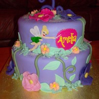 Tinkerbell Cake 10" chocolate & 8" white cakes, covered/decorated in fondant. Cake topped with cake sprinkles for "fairy dust"....